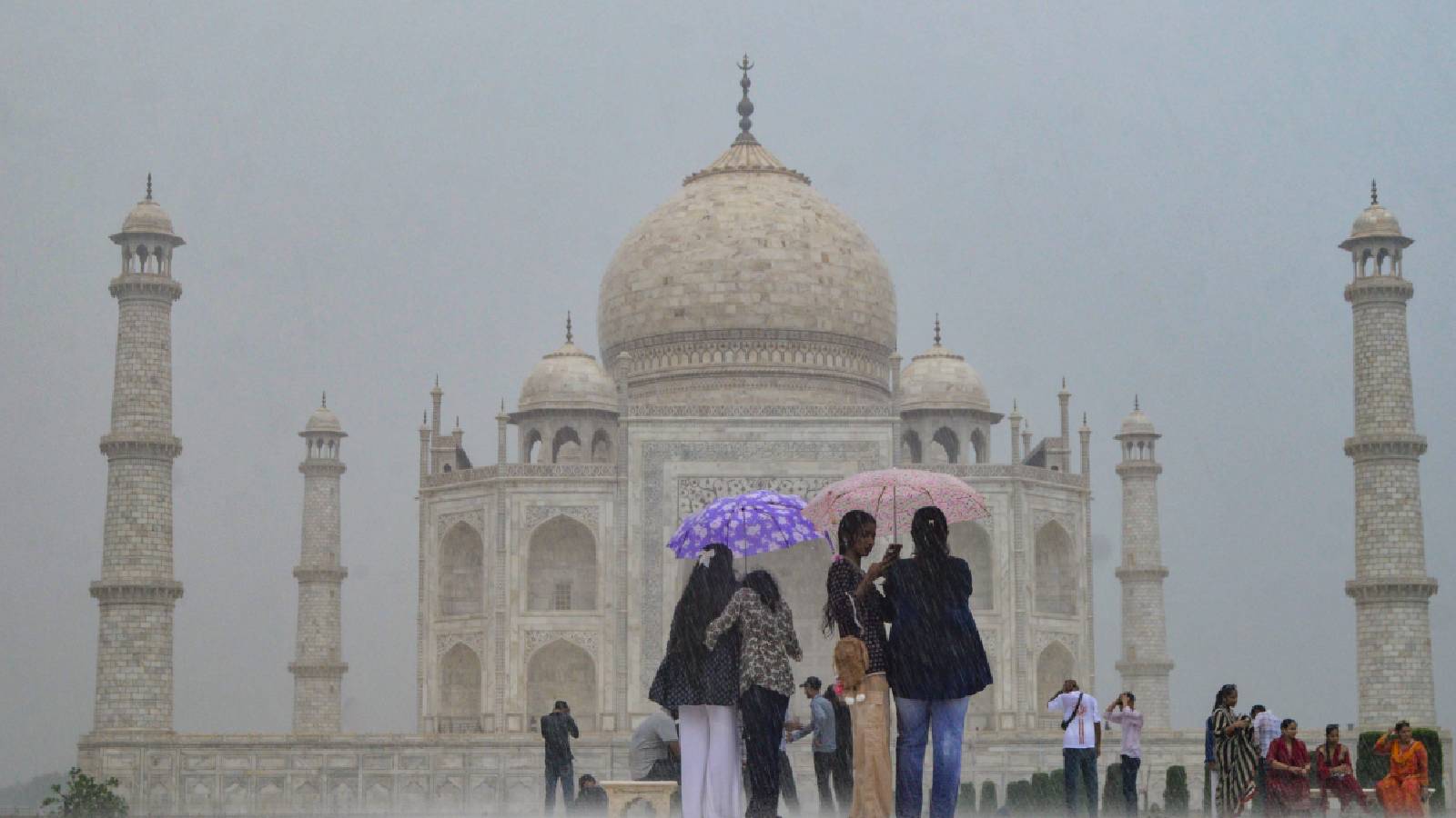 Tourists gather amid heavy rain as monsoon brings its signature charm