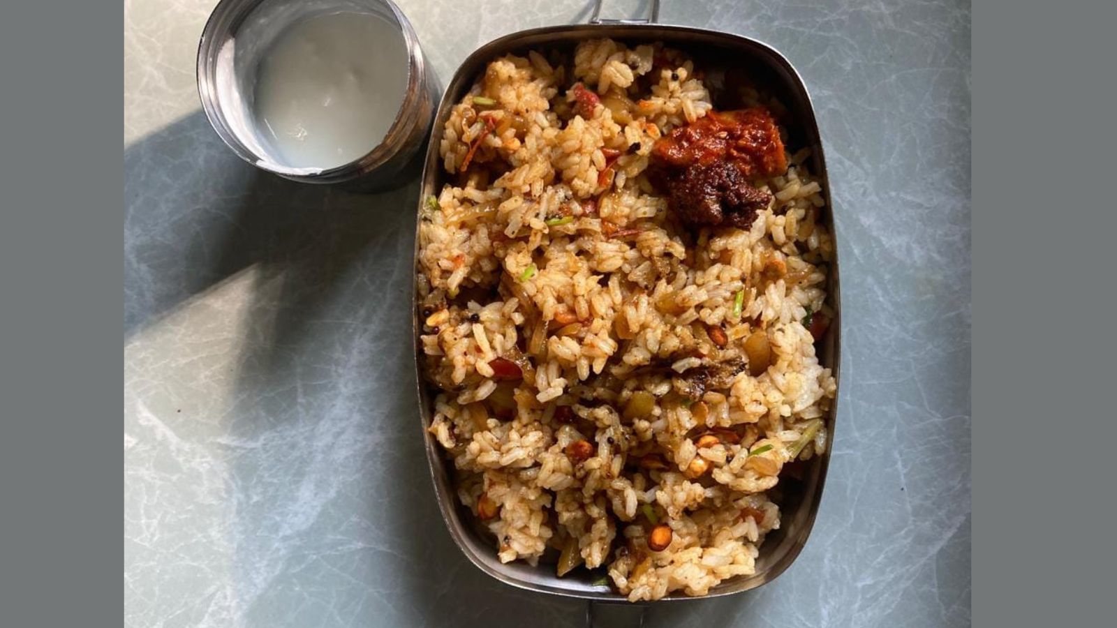 Running short of time to prepare lunch? Try this quick and flavourful Tomato Rice