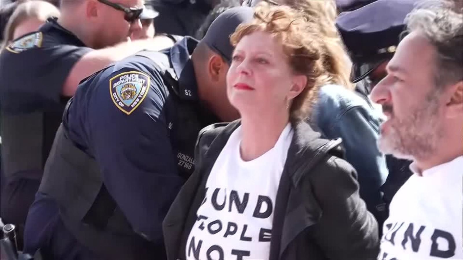 Hollywood actor Susan Sarandon getting arrested by NYPD during protest. Photo: Screengrab/Reuters