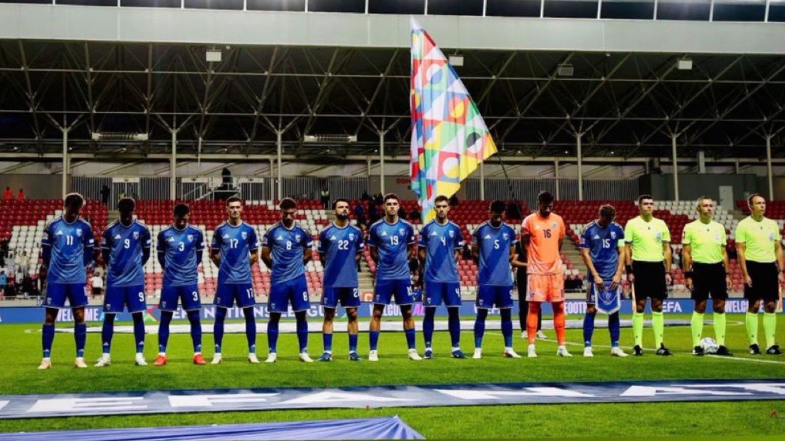 Kosovo players pose during Israel's national anthem. Photo: X/@FootballKosovo