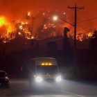 From Canada to Albania, wildfires force communities to flee