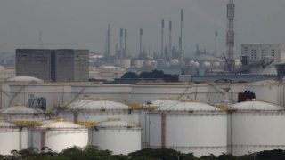 Asian shares mostly rise as oil prices fall, Hormuz talks in focus