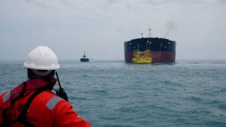 Asian markets lose momentum as Iran uncertainty tempers global rally