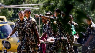 Nepal warns of fresh flood risk as search continues for missing people