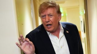 Trump signs sanctions law threatening up to 100% tariffs on India, China
