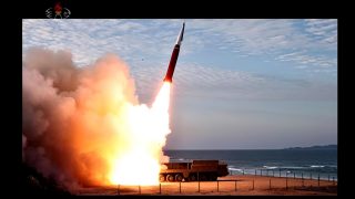 North Korea reports test of new combat weapon system