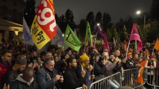 Hundreds gather for anti-racism rally after deadly shooting in Paris suburb